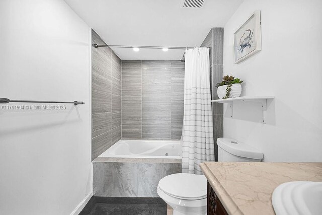 bedroom with ensuite bathroom, a closet, and ornamental molding