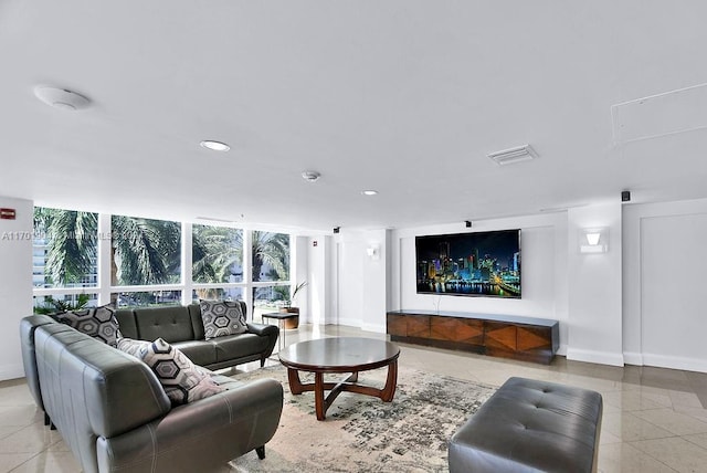 living room with light tile patterned flooring