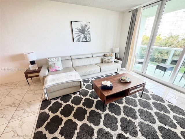 living room with a textured ceiling