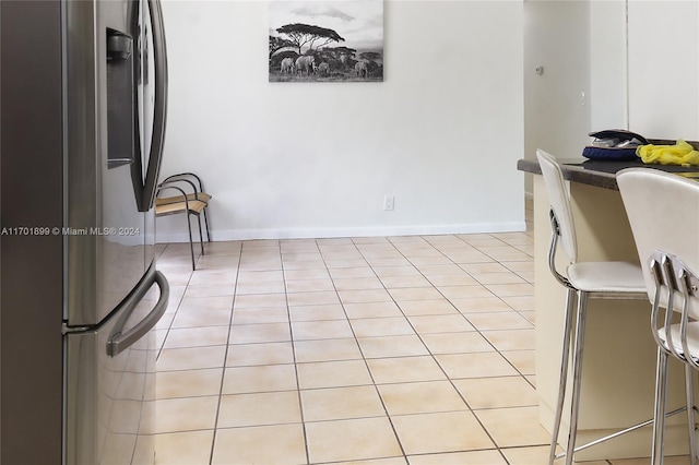 view of tiled dining space