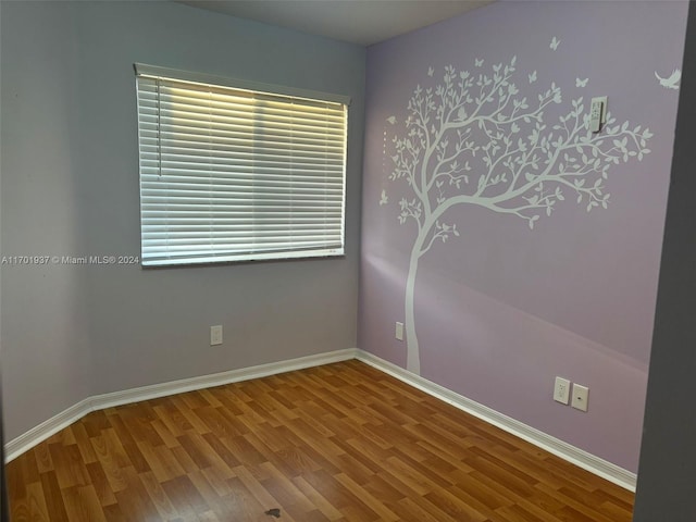 empty room featuring hardwood / wood-style floors