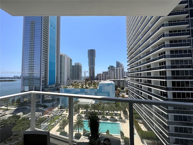 balcony featuring a water view