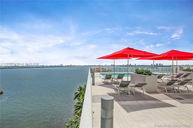 view of patio / terrace featuring a water view