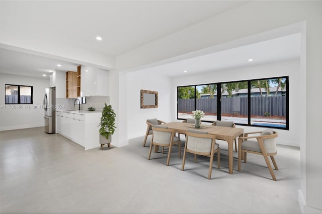 dining space with sink