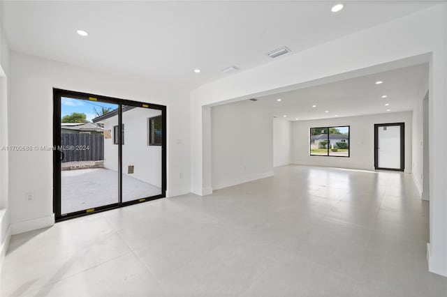 spare room featuring plenty of natural light