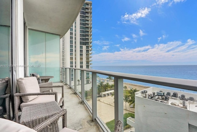 balcony featuring a water view