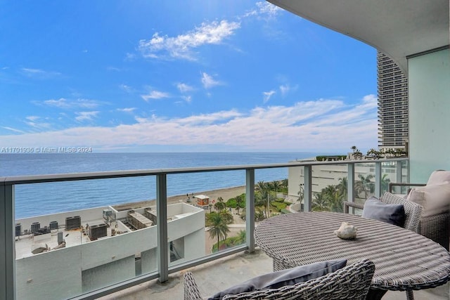 balcony featuring a water view