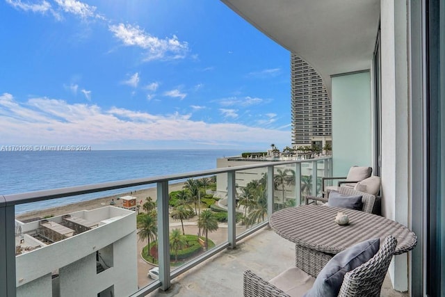 balcony featuring a water view