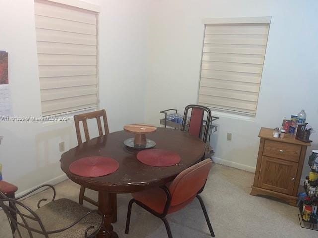 view of carpeted dining room