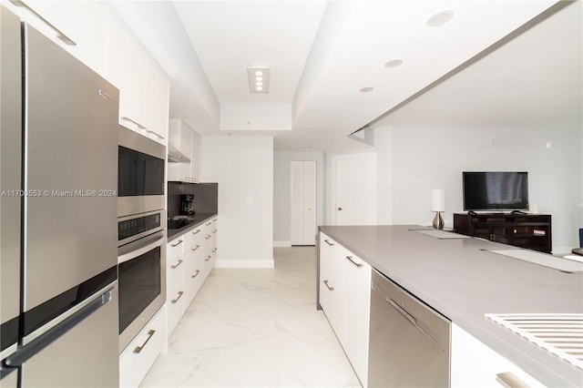 kitchen with white cabinets and stainless steel appliances