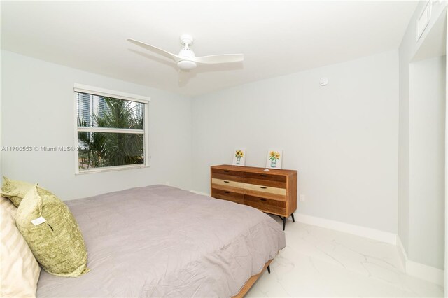 bedroom featuring ceiling fan