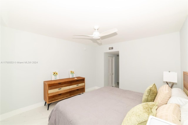 bedroom featuring ceiling fan