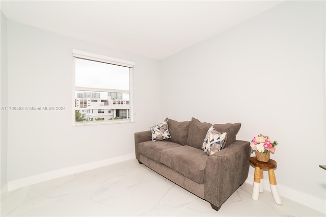 17145 N Bay Rd Unit 4607, Sunny Isles Beach, FL 33160 - living area with baseboards and marble look tiles