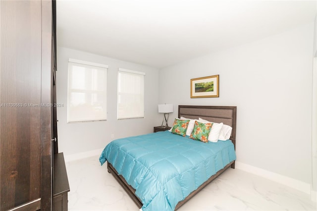17145 N Bay Rd Unit 4607, Sunny Isles Beach, FL 33160 - bedroom featuring marble finish flooring and baseboards