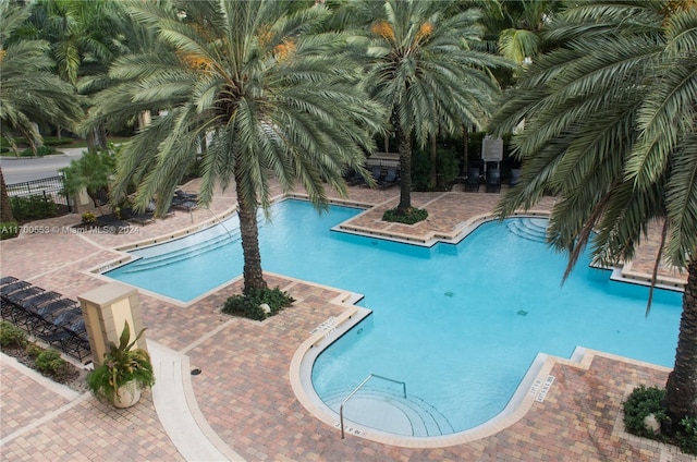 17145 N Bay Rd Unit 4607, Sunny Isles Beach, FL 33160 - community pool featuring a patio area
