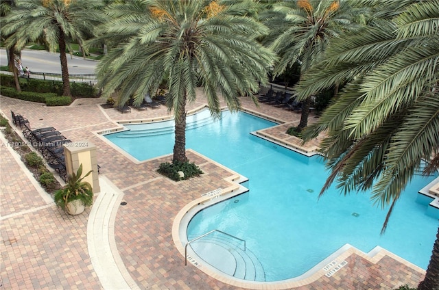 view of swimming pool featuring a patio