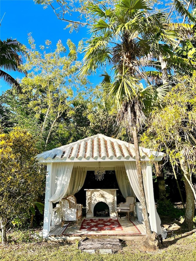 view of patio / terrace with a fireplace