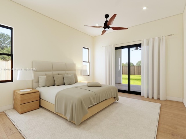 bedroom featuring access to exterior, ceiling fan, hardwood / wood-style floors, and multiple windows