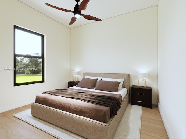 bedroom featuring ceiling fan and wood-type flooring