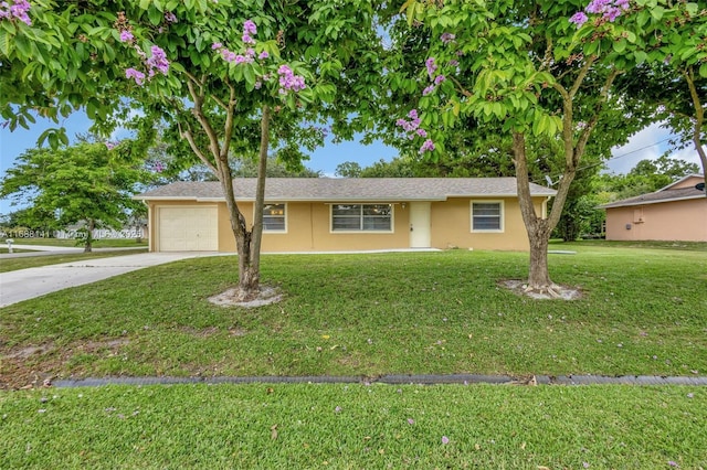 1101 SW Addie St, Port St Lucie, FL 34983 - ranch-style home featuring stucco siding, concrete driveway, a front lawn, and a garage
