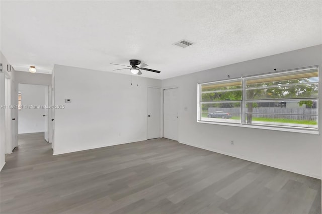 1101 SW Addie St, Port St Lucie, FL 34983 - spare room featuring a ceiling fan and wood finished floors