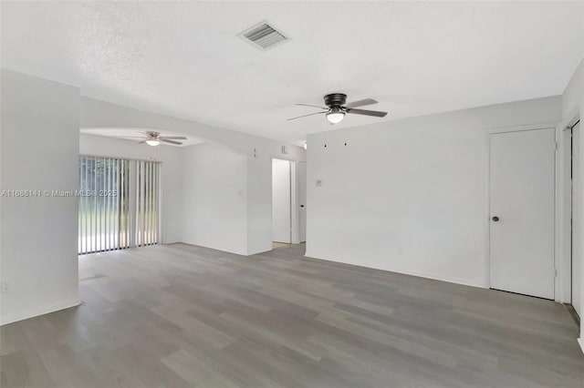 1101 SW Addie St, Port St Lucie, FL 34983 - unfurnished room with a ceiling fan and wood finished floors