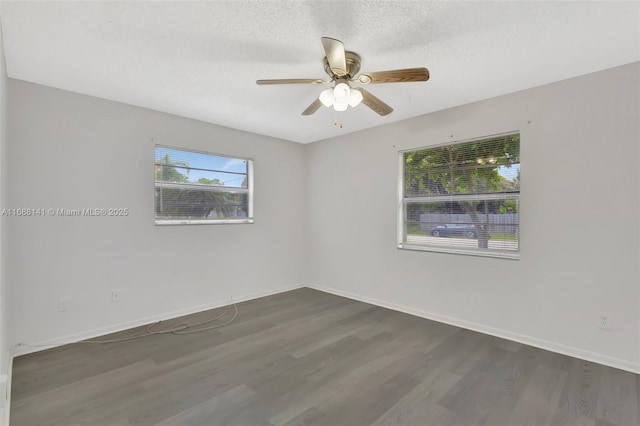 1101 SW Addie St, Port St Lucie, FL 34983 - unfurnished room featuring wood finished floors, a ceiling fan, and a textured ceiling
