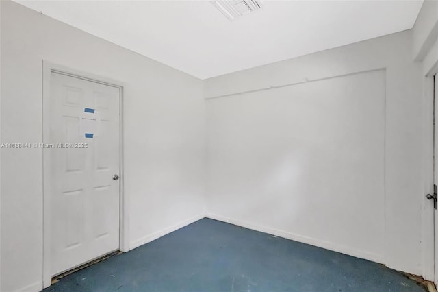 1101 SW Addie St, Port St Lucie, FL 34983 - spare room featuring concrete flooring and baseboards
