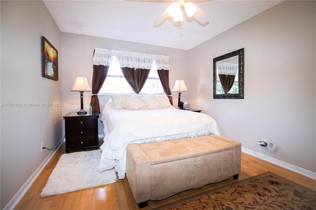 bedroom featuring light wood-type flooring and ceiling fan