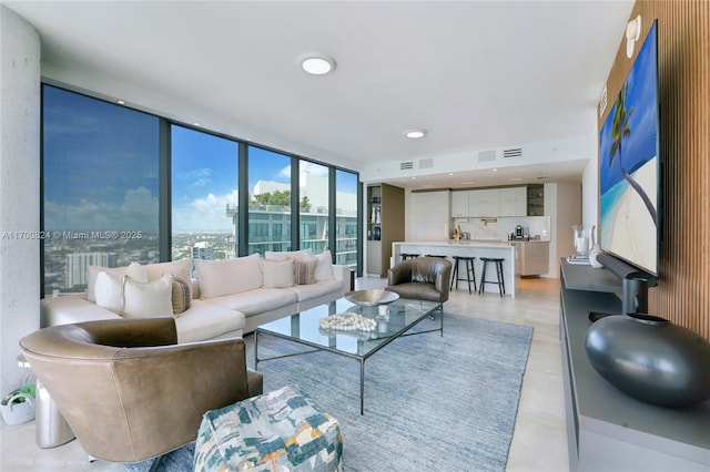 living room with a wall of windows