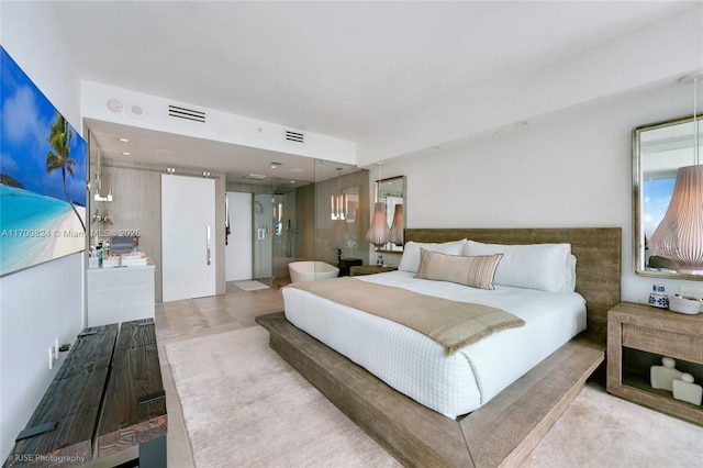 bedroom featuring visible vents