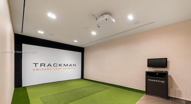 game room with carpet flooring, golf simulator, and recessed lighting