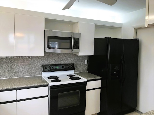 kitchen with tasteful backsplash, black fridge, ceiling fan, white electric stove, and white cabinetry