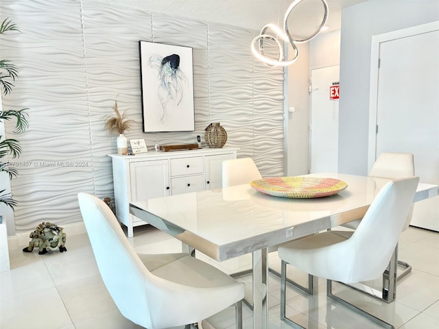 tiled dining room with tile walls