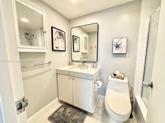 bathroom with tile patterned flooring, vanity, and toilet