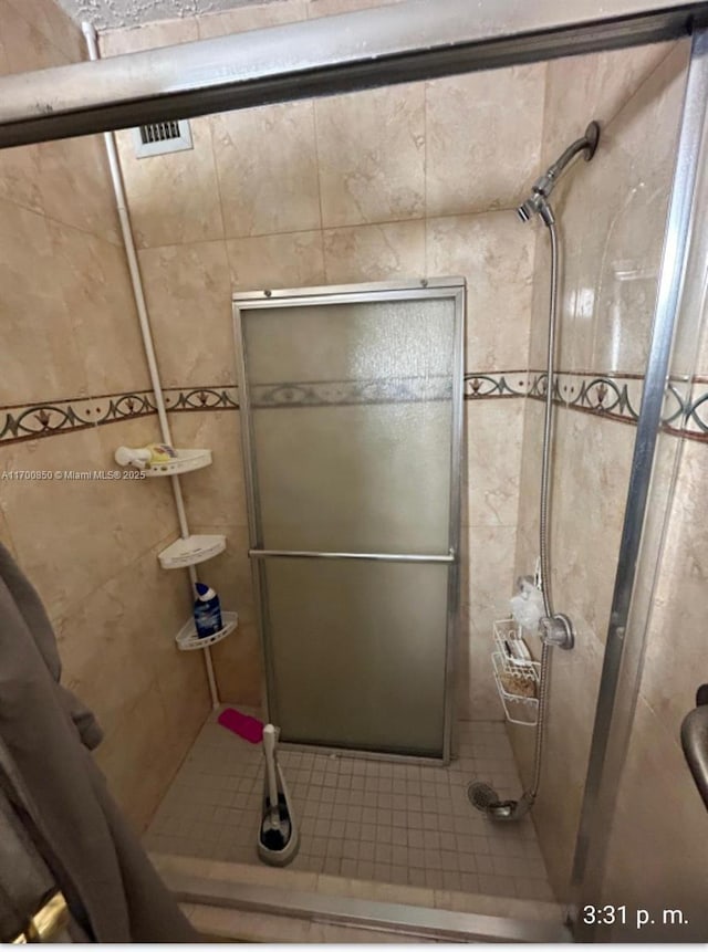 bathroom with walk in shower