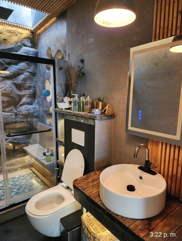 bathroom with toilet and sink