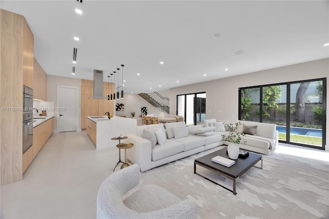 living room featuring sink