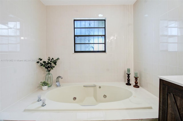 bathroom with a relaxing tiled tub