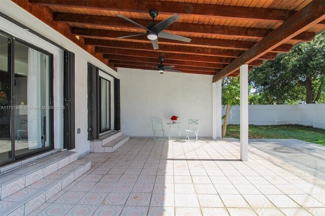 view of patio featuring ceiling fan