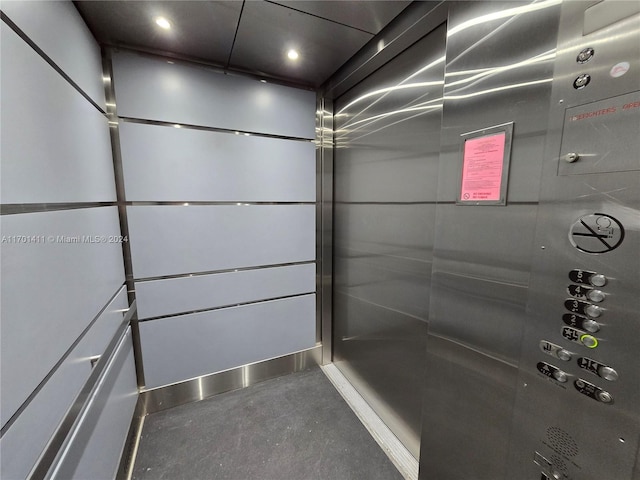 empty room featuring light tile patterned floors and a textured ceiling