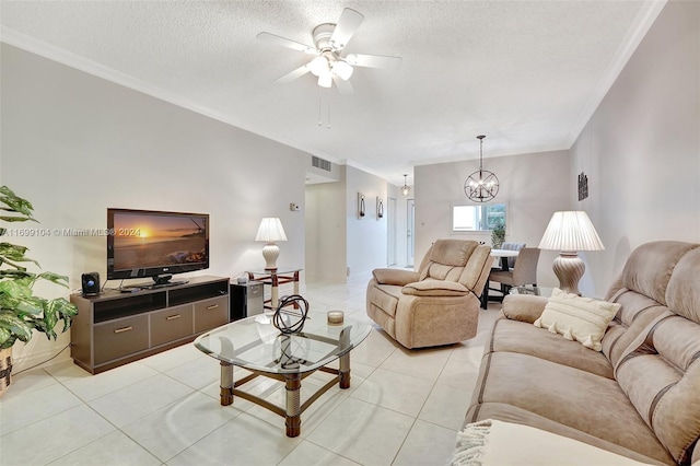 living room featuring light tile patterned floors, ceiling fan with notable chandelier, and ornamental molding