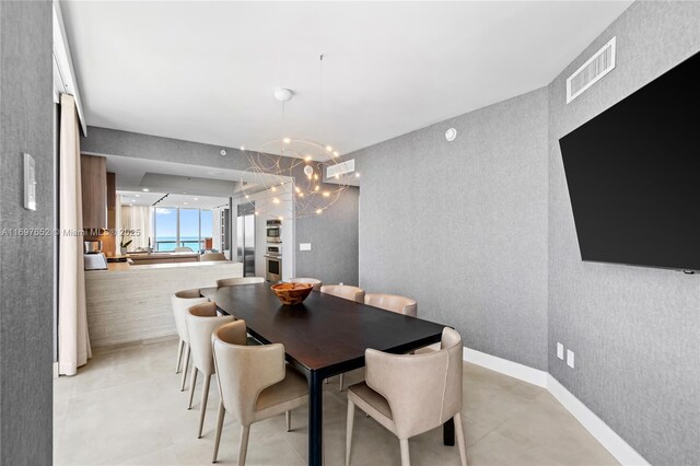 17875 Collins Ave Unit 1801, Sunny Isles Beach, FL 33160 - living room with floor to ceiling windows, a water view, and recessed lighting