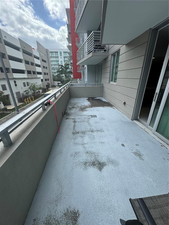 view of patio / terrace with a balcony