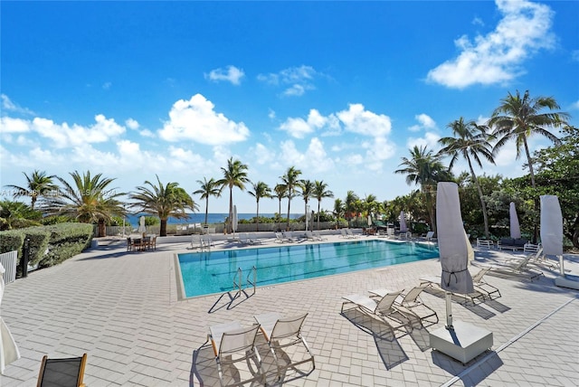 view of swimming pool with a patio area