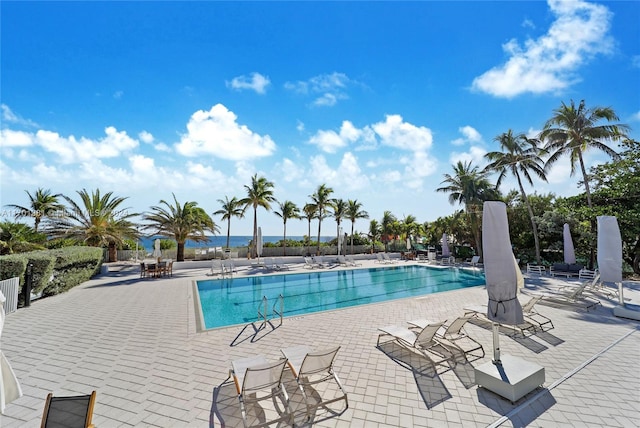605 Ocean Dr Unit 4L, Key Biscayne, FL 33149 - community pool featuring a patio area