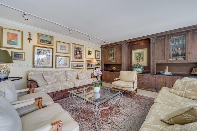 605 Ocean Dr Unit 4L, Key Biscayne, FL 33149 - living area featuring rail lighting, ornamental molding, and tile patterned flooring