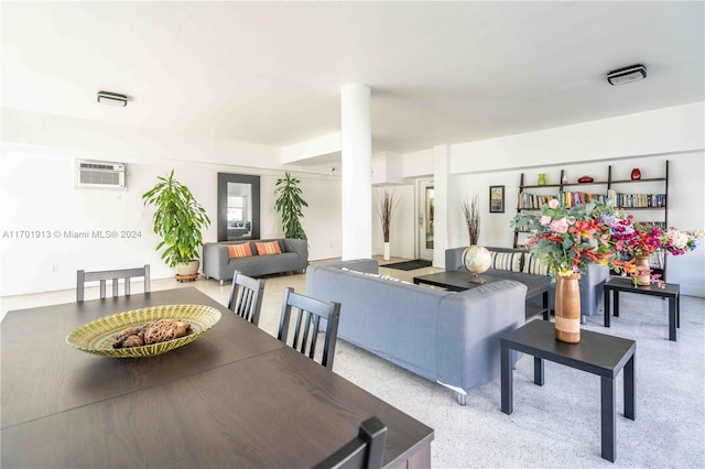 dining area with a wall mounted air conditioner