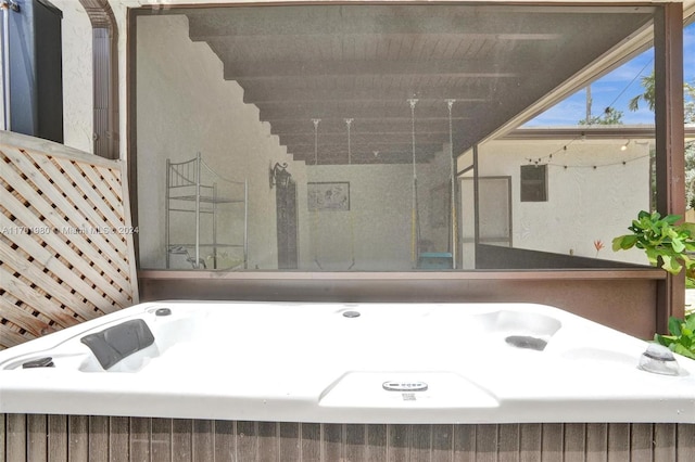 bathroom featuring beam ceiling