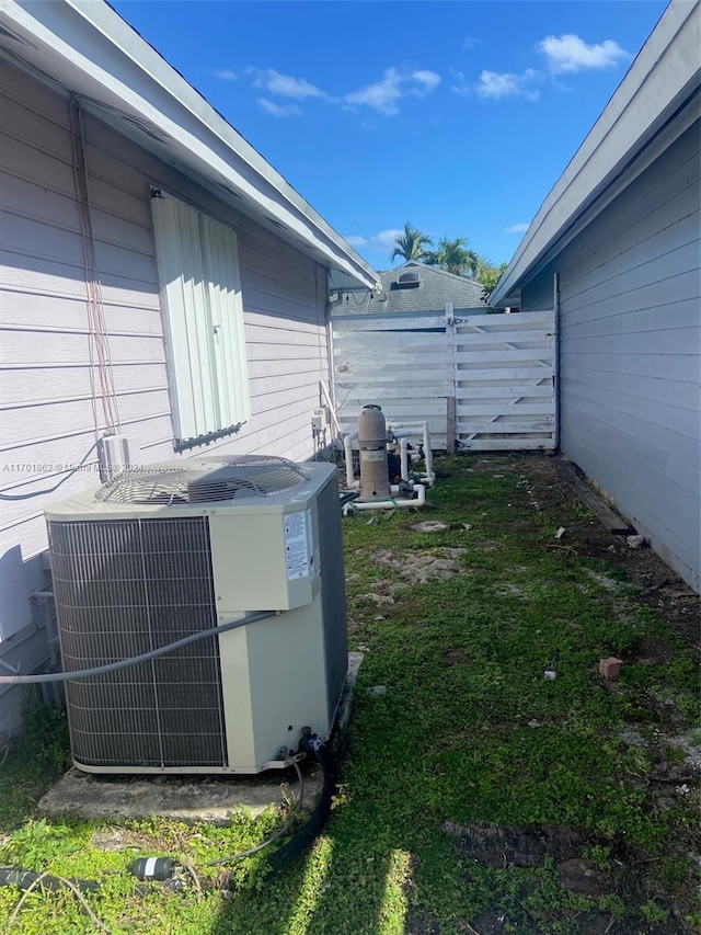 view of yard with central air condition unit